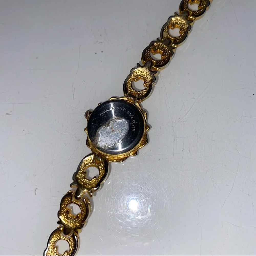Jacques Couture Quartz movement gold‎ toned watch